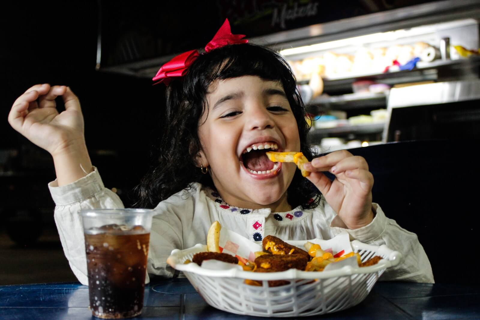 Girl Eating Fries