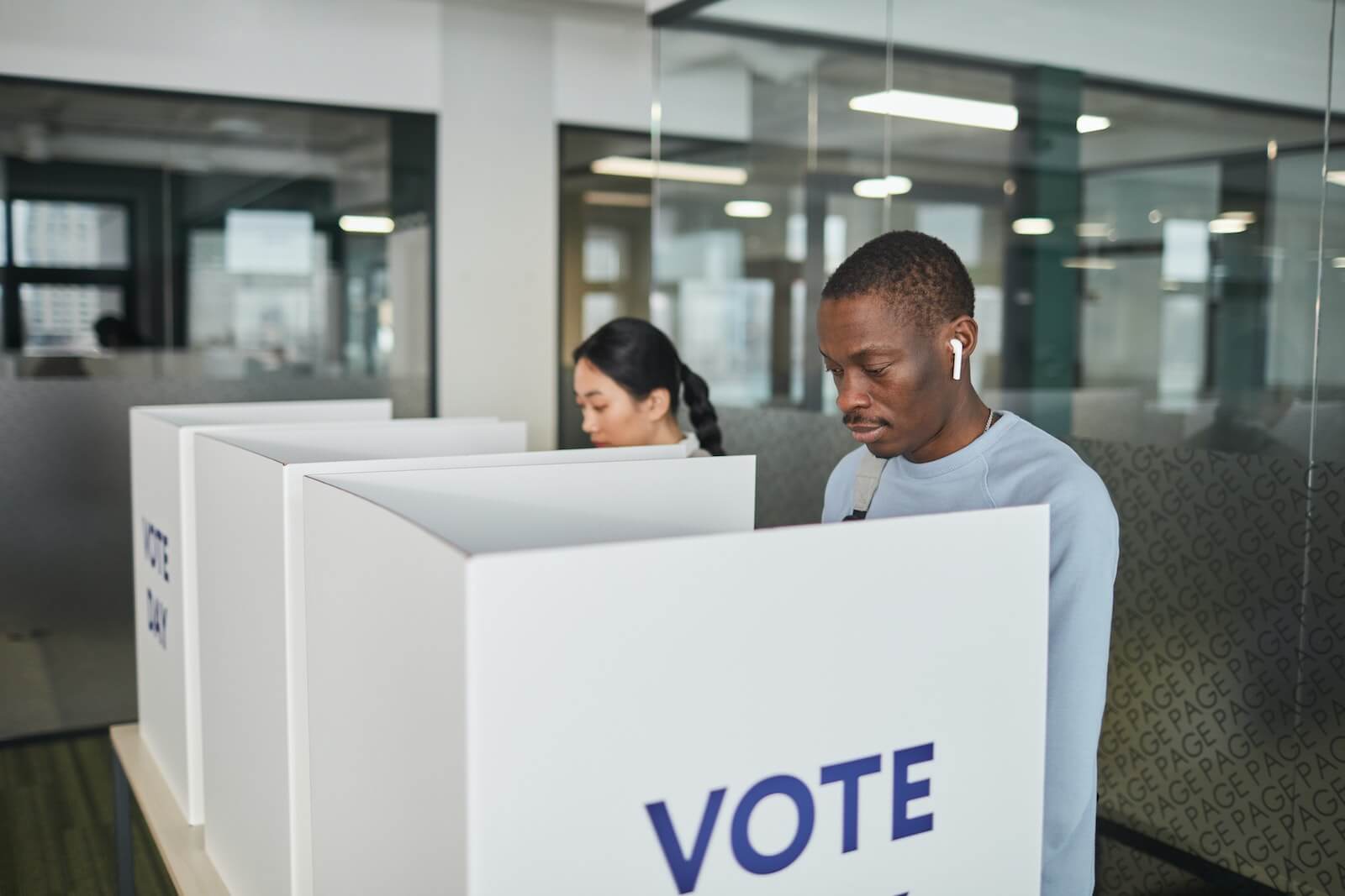 Man in a voting booth