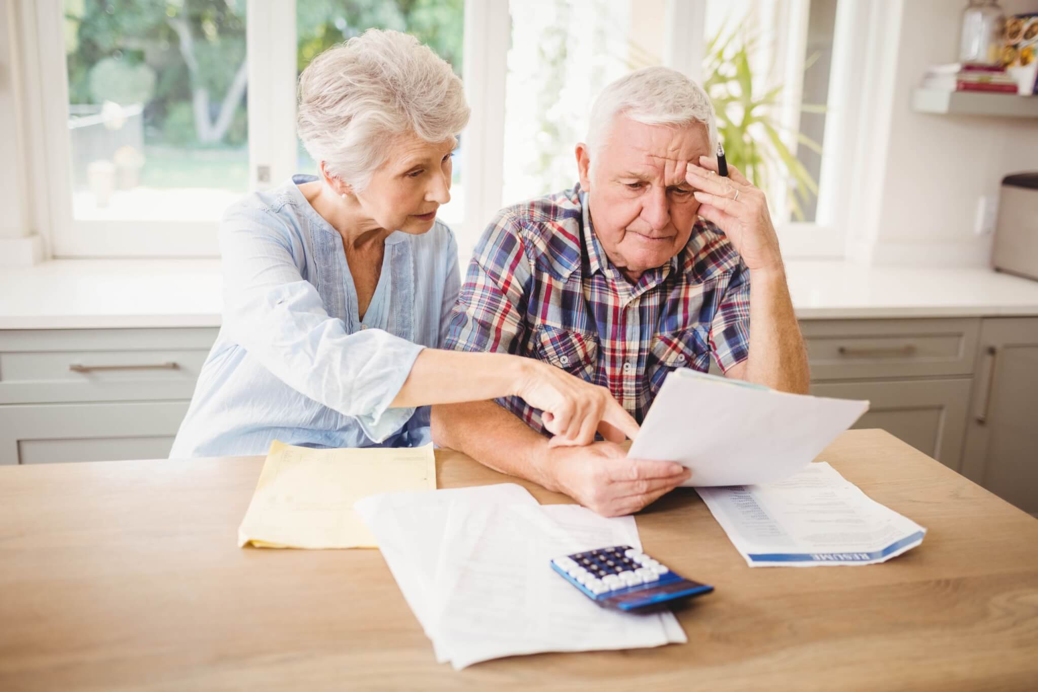 Older couple worried, stressed about their bills