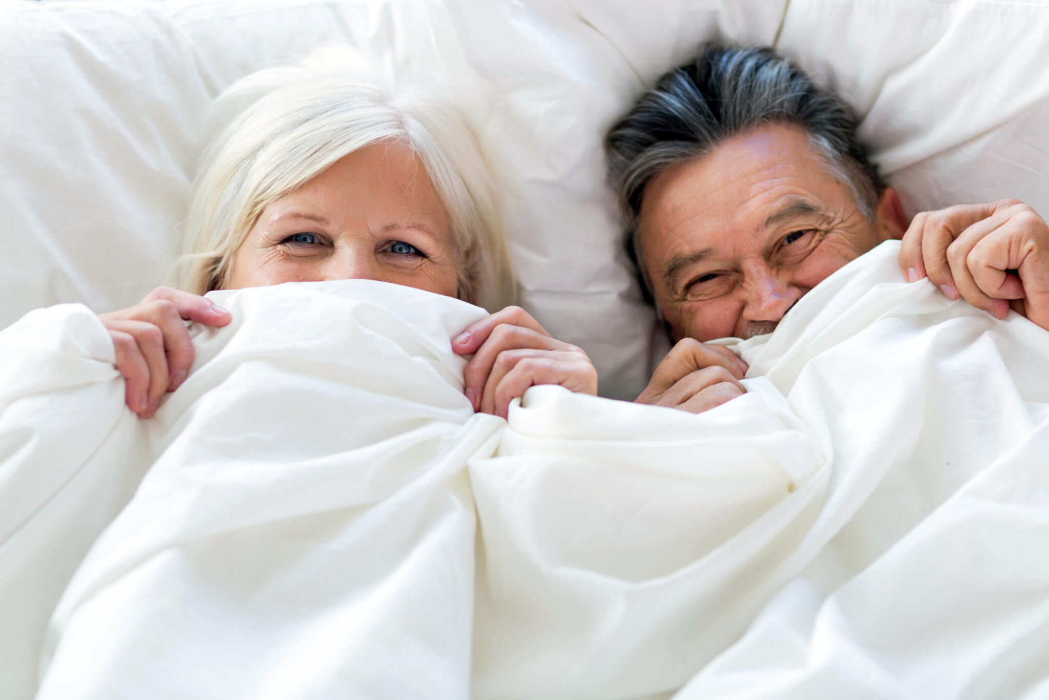 Older couple in bed