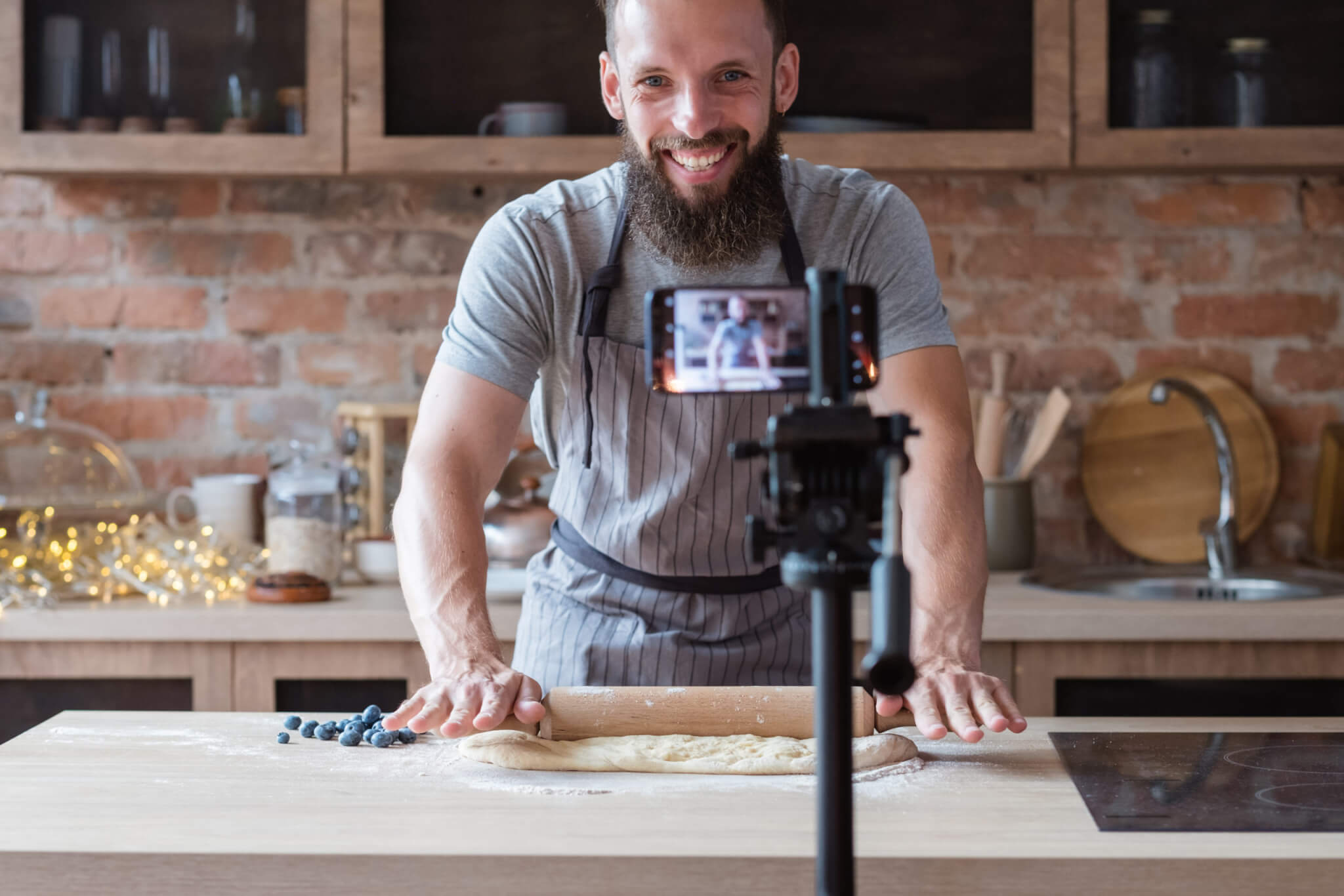 Food vlogger streaming live while cooking on social media