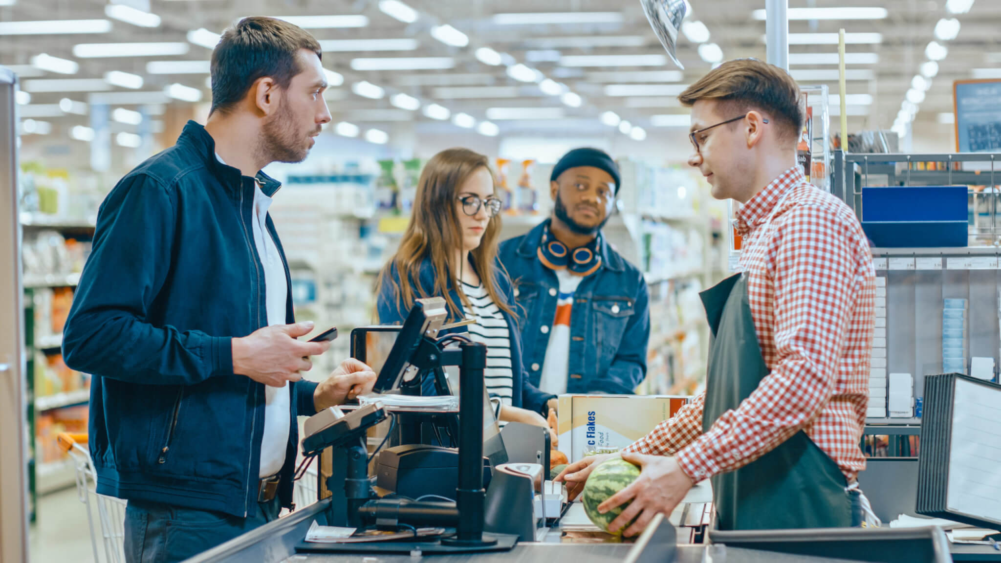 Supermarket checkout line at grocery store