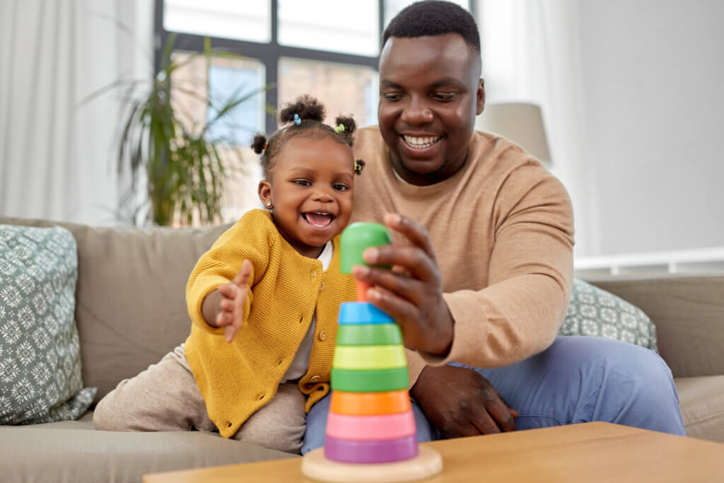 Father playing with baby