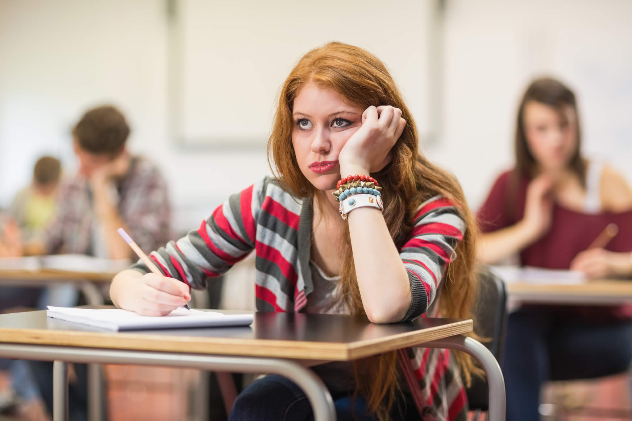 Bored high school student in class