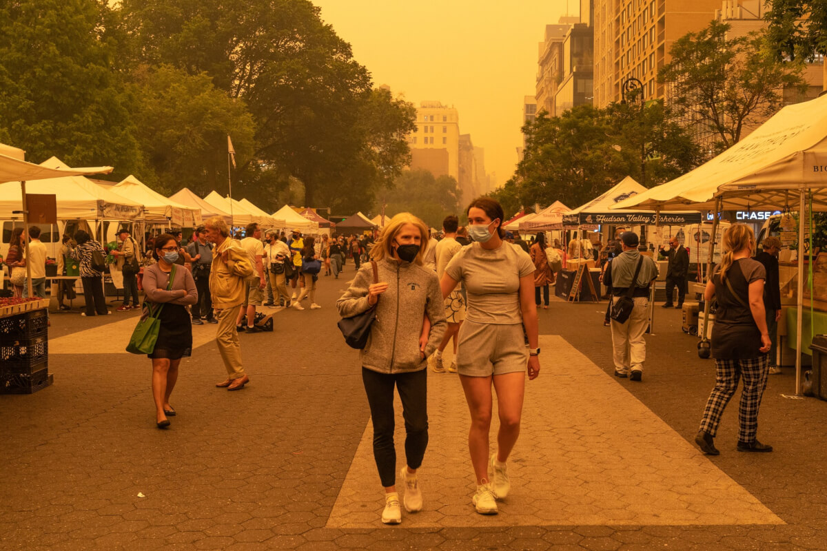 Many people wear facial masks on June 7, 2023 because of bad air quality brought in by smoke of Canadian wildfires