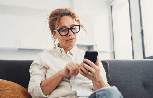 Woman scrolling on her smartphone