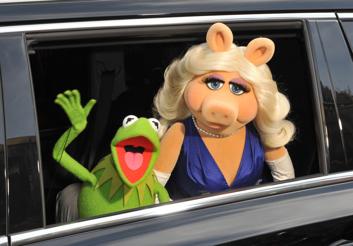 Muppets' characters Kermit the Frog & Miss Piggy at the world premiere of their movie Disney's "Muppets Most Wanted" at the El Capitan Theatre