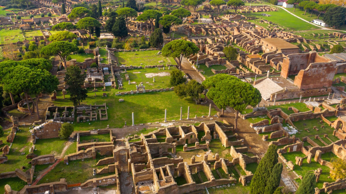 Aerial view of the Temple of Rome and Augustus and Capitolium, two ancient Roman temples located in the archaeological area of Ostia Antica, near Rome, Italy.