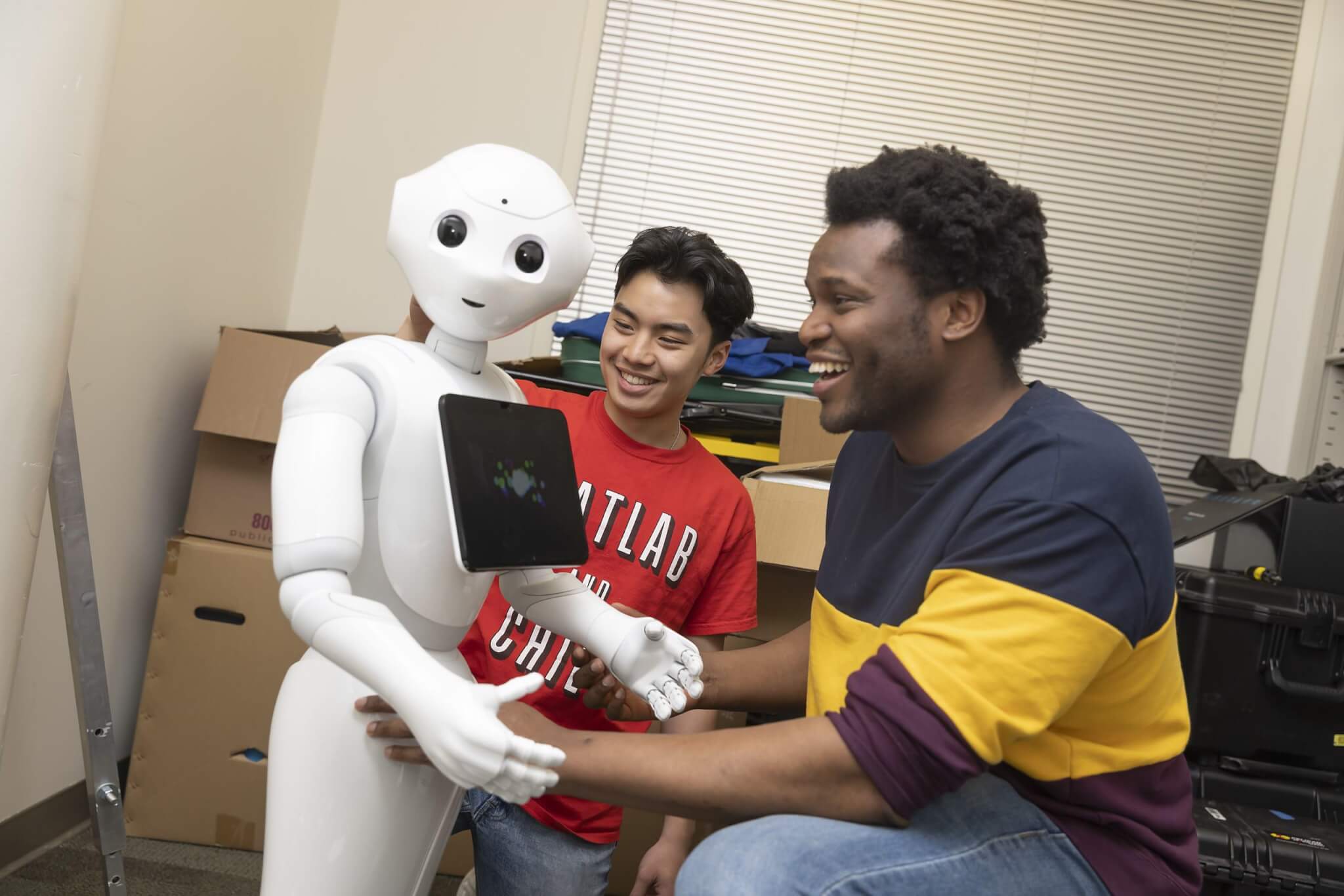 A robot with 2 GIT students