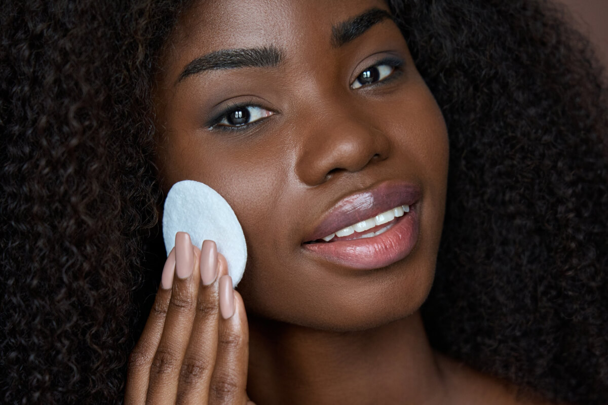 A woman applying foundation